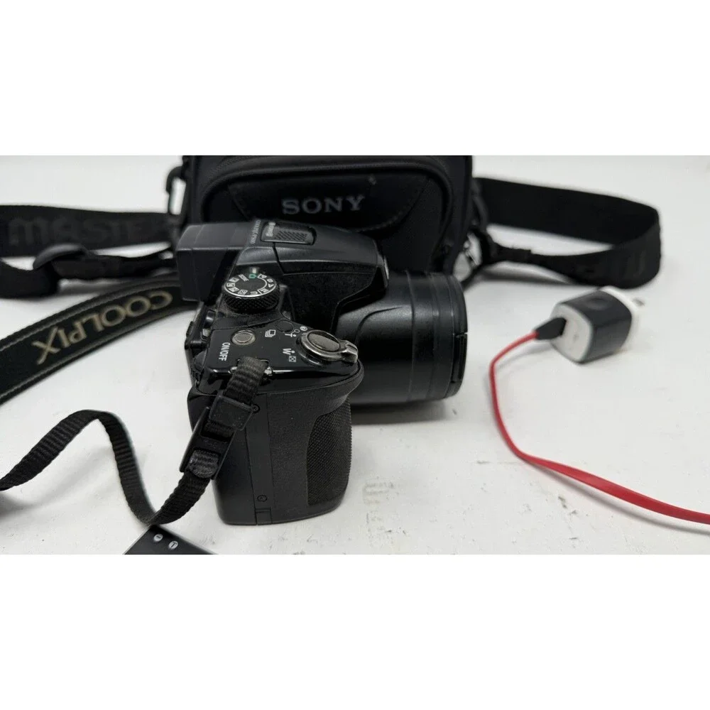 Nikon COOLPIX P500 36X Zoom 12.1MP Tilt Screen Digital Camera - Bundle - Nice